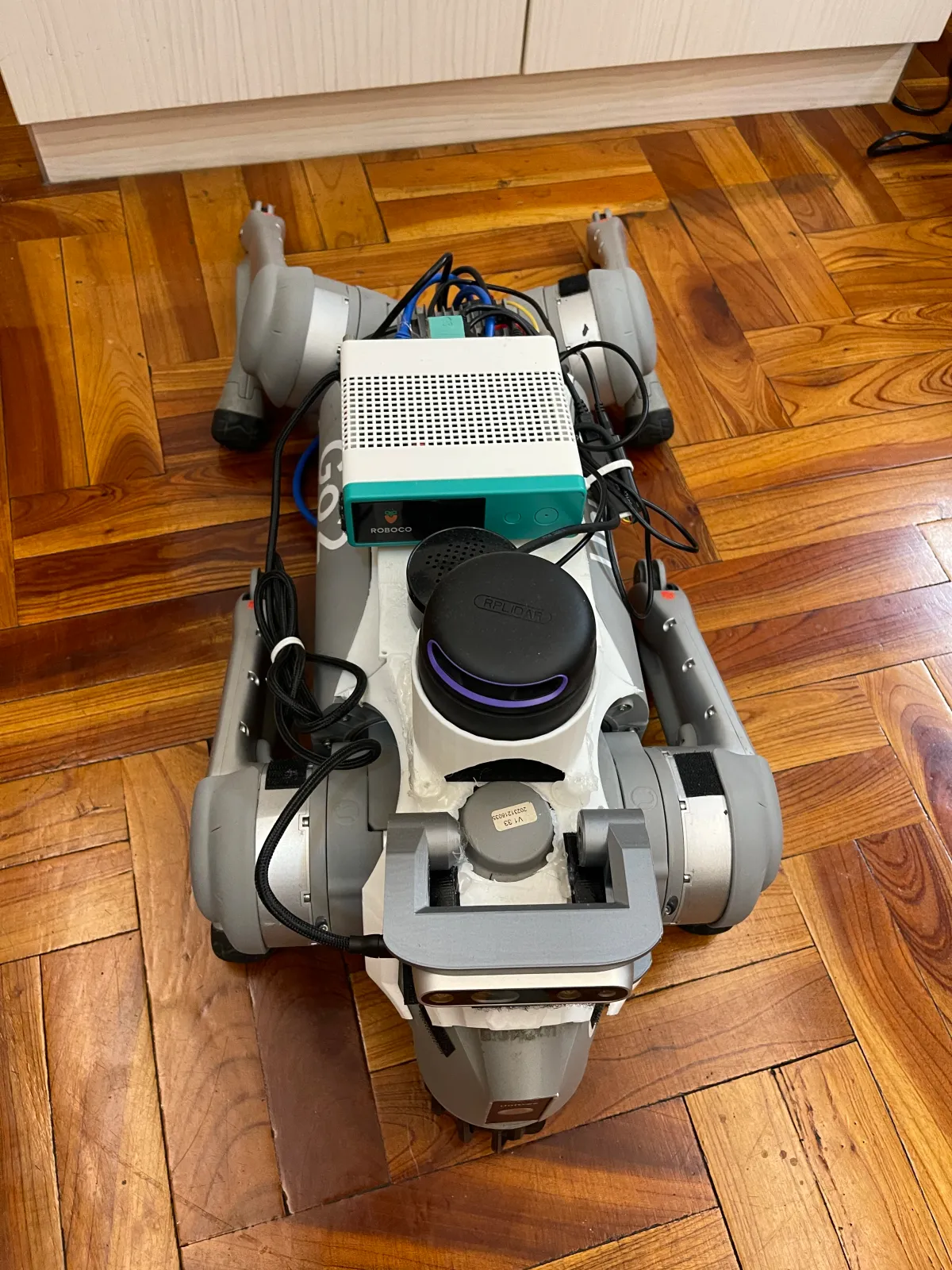 Another top view of the compute box, lidar and wiring on PawAI's back