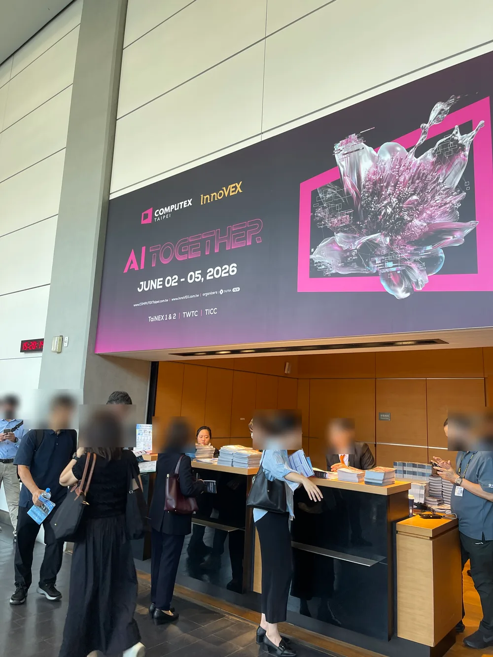 A large sign at the Computex 2026 entrance reading AI Together and the show dates, with the registration counters below