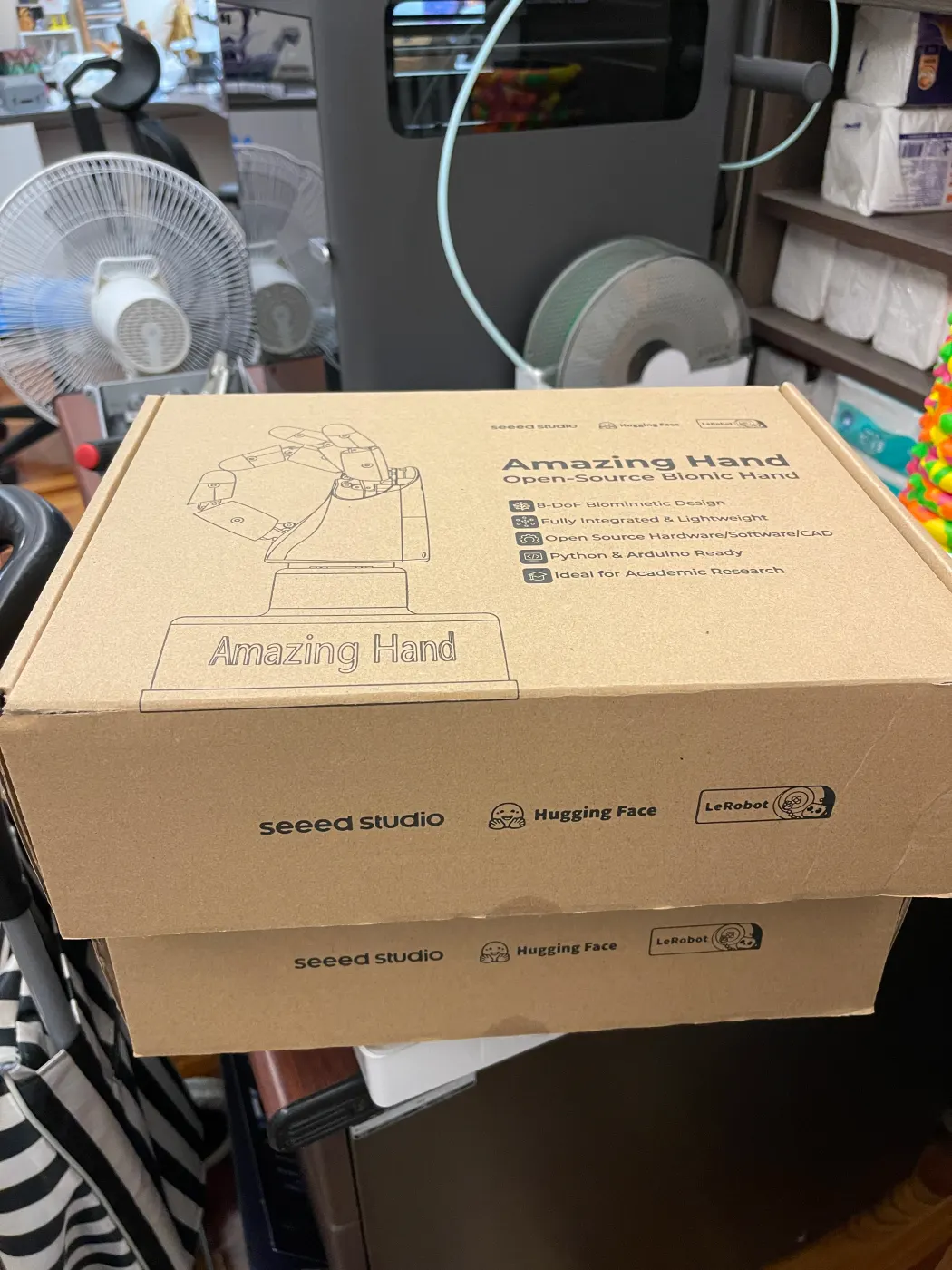 Two Seeed Studio Amazing Hand kits stacked together