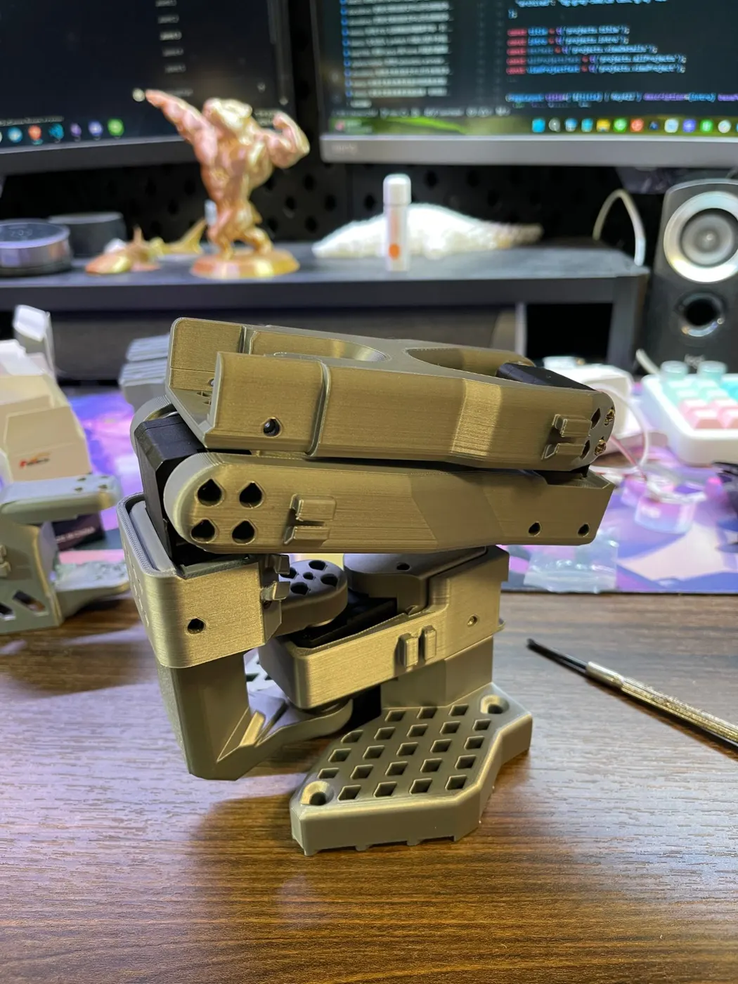 An assembled SO-101 arm in its folded position