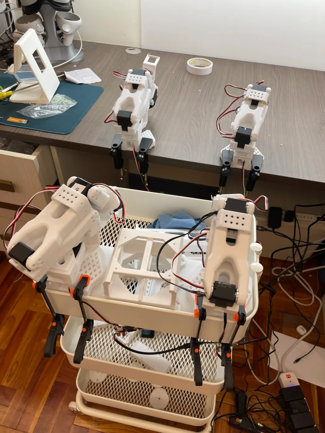 Another angle on the four arms on the desk and cart